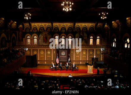 Washington, DC, USA. 12th May, 2015. United States President Barack Obama participates in a panel discussion with Harvard professor, Robert Putnam (2R), president of the American Enterprise Institute, Arthur Brooks (R) and moderated by E.J. Dionne (L), during the Catholic-Evangelical Leadership Summit on overcoming poverty at Georgetown University on May 12, 2015. Credit:  dpa picture alliance/Alamy Live News Stock Photo