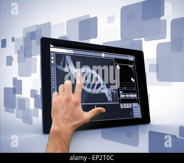 Man pointing at DNA interface on digital tablet