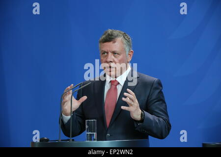 Berlin, Germany. 13th May, 2015. Jordan Abdullah II. Ibn al-Hussein talks on Syrian refugee-wave, humanitarian aid and Palestinian conflict, during his official visit in Germany and meeting with Chancellor Angela Merkel. © Jakob Ratz/Pacific Press/Alamy Live News Stock Photo