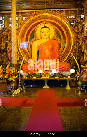 Large Buddha statue Gangaramaya Buddhist Temple, Colombo, Sri Lanka, Asia Stock Photo