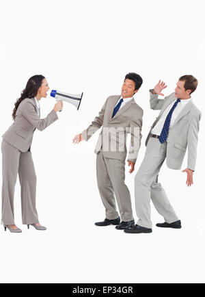 Business man, noise and megaphone by ear in studio for communication ...