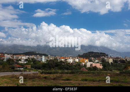 Partial view of Kalamata town with the old medieval fortress on the hill against Taygetos mountain, Messinia prefecture, Greece Stock Photo