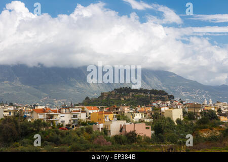 Partial view of Kalamata town with the old medieval fortress on the hill against Taygetos mountain, Messinia prefecture, Greece Stock Photo