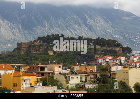 Partial view of Kalamata town with the old medieval fortress on the hill against Taygetos mountain, Messinia prefecture, Greece Stock Photo