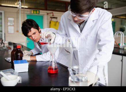 Young chemistry students making an experiment Stock Photo