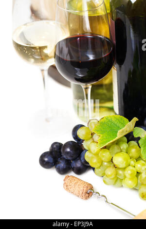 Glasses of white and rose wine and grapes over white Stock Photo