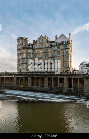 View to Old Empire Hotel Victorian building from across river avon Bath Somerset