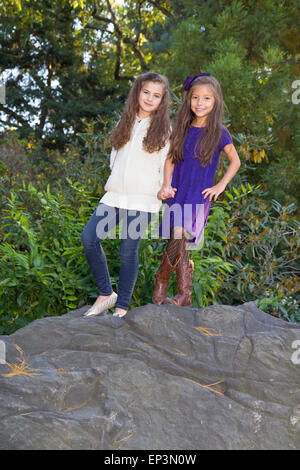 Two pretty girls in the park Stock Photo - Alamy