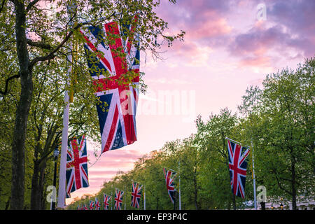 Lines of union jack flags hanging along the Mall, London Stock Photo