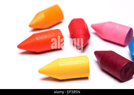 many colorful crayons scattered on a white background Stock Photo - Alamy