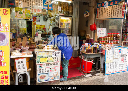 Tai O fishing Village outdoor street food market located on Lantau Island, Hong Kong, China Stock Photo