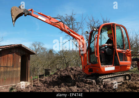 Bauarbeiter in Aktion Stock Photo