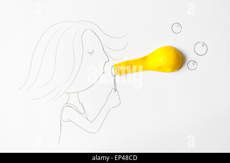 Conceptual girl blowing bubbles Stock Photo
