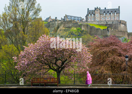 Woman walking under the rain in Edinburgh, Scotland Stock Photo