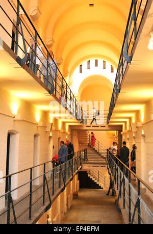 Lincoln, UK - April 9, 2015: Tourists visit medieval prison inside Lincoln Castle Stock Photo