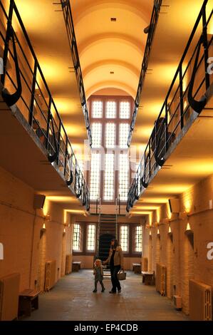 Lincoln, UK - April 9, 2015: Tourists visit medieval prison inside Lincoln Castle Stock Photo