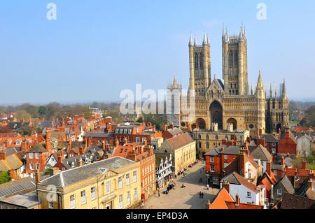 Lincoln, UK - April 9, 2015: Tourists head towards the Lincoln Cathedral, major landmark and the third largest cathedral the UK Stock Photo