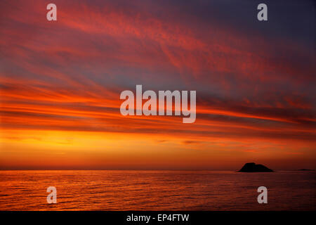 Sunrise in the Aegean, somewhere between Lemnos & Agios Efstratios (Ai Stratis) islands, North Aegean, Greece Stock Photo