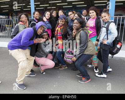 Group of teen girls and their chaperones pose for photo during trip to Coney Island in Brooklyn, NY. Stock Photo