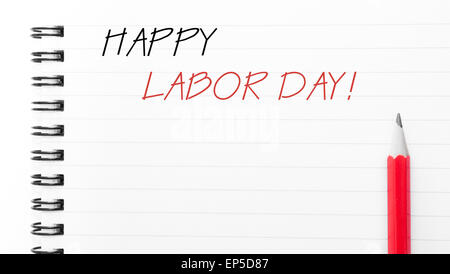 Happy Labor Day Text written on notebook page, red pencil on the right. Motivational Concept image Stock Photo