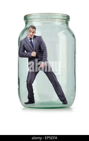 Young businessman in glass jar Stock Photo