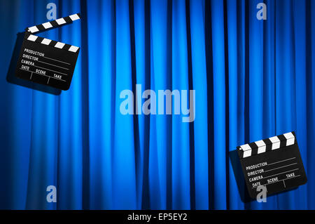 Movie clapper board against curtain Stock Photo