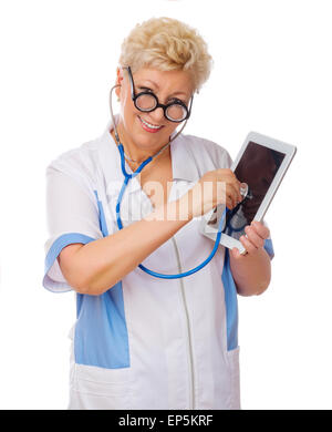 Mature doctor listen tablet PC by stethoscope isolated Stock Photo