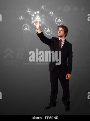 Businessman pressing simple type of start buttons Stock Photo