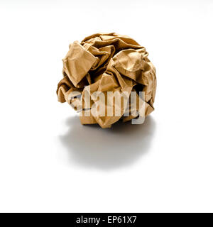 brown coloe crumpled paper ball on a white background Stock Photo