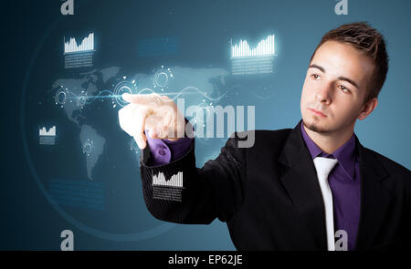 Businessman pressing high tech type of modern buttons Stock Photo