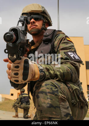Madrid, Spain. 13th May, 2015. A Spanish soldier from the Brigada Paracaidista during room cleaning training in joint exercise Operation Skyfall May 13, 2015 in Madrid, Spain. Stock Photo