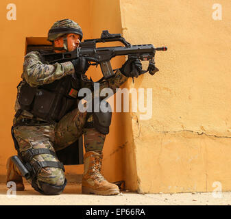 Madrid, Spain. 13th May, 2015. A Spanish soldier from the Brigada Paracaidista during room cleaning training in joint exercise Operation Skyfall May 13, 2015 in Madrid, Spain. Stock Photo