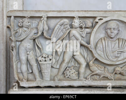 Sarcophagus with man's bus in a clipeus. Cupid holding ducks. Marble. 3rd c. AD. Ostia. National Roman Museum. Stock Photo