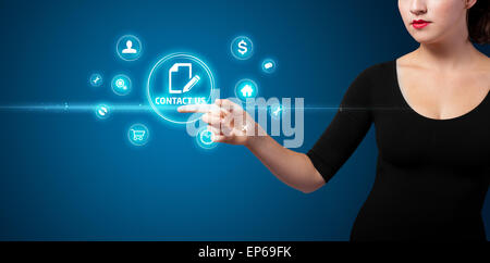 Businesswoman pressing virtual media type of buttons Stock Photo