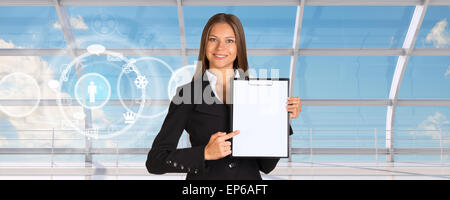 Young businesswoman in black suit Stock Photo
