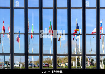 Flags of the European Union countries reflecting on the European Commission building, European Quarter, Luxembourg Stock Photo
