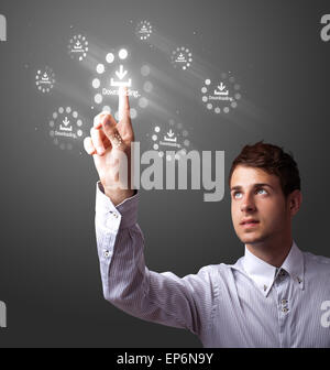 Businessman pressing simple type of start buttons Stock Photo