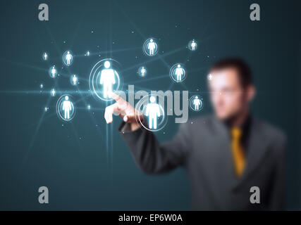 Businessman pressing modern social type of icons Stock Photo