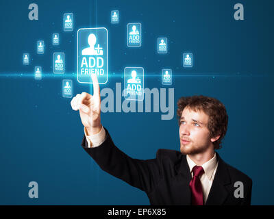 Businessman pressing modern social type of icons Stock Photo