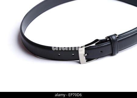 A black leather belt isolated on a white background. Stock Photo