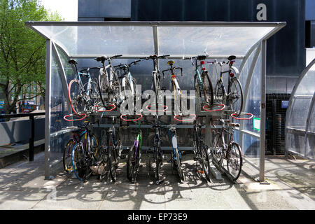 Two level bicycle parking at Euston Station, London, England Stock Photo