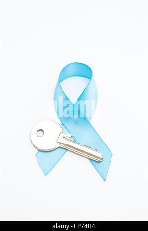 Blue ribbon for prostate cancer and silver key Stock Photo - Alamy