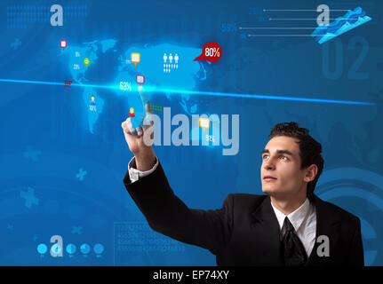 Businessman pressing social media button on digital map Stock Photo