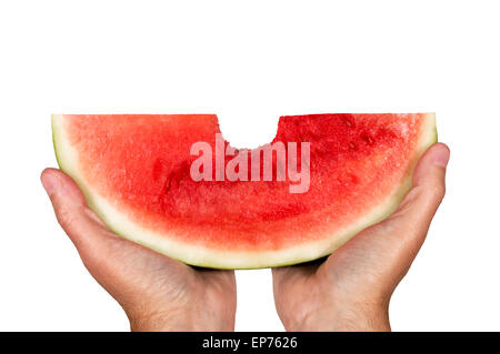 Take A Bite Out Of This Delicious Juicy Watermelon.  Hands holding a big slice of watermelon on white background Stock Photo