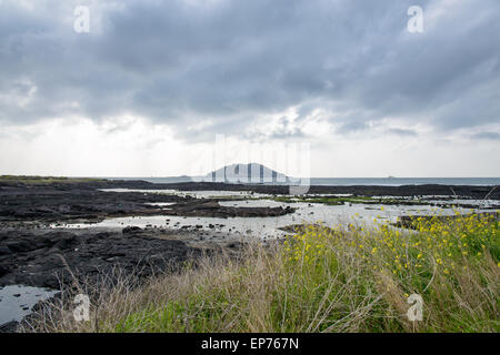 landscape of Biyangdo island in a cloudy day, view from Hyeopjae beach in Aewol in Jeju Island, Korea. Stock Photo