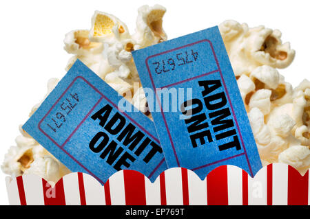 Movie Night.  Small bucket of popcorn with movie tickets shot up close on white background Stock Photo