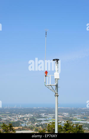 lgihtning rod and cctv camera for fire prevention at the top of Jeoji Oreum in Jeju Island, Korea. Stock Photo