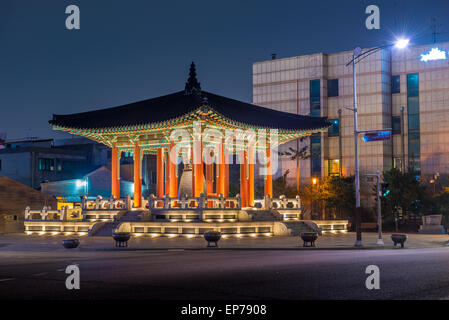 The bell pavilion of Hwaseong Fortress lit up as evening comes on. Stock Photo