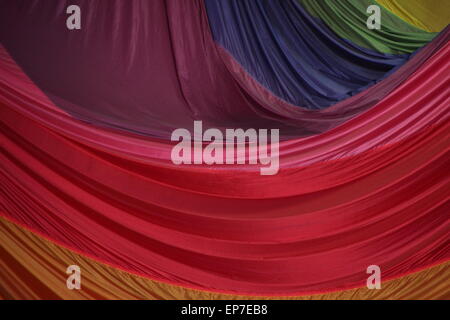 Segment of Folded Parachute Fabric in Colorful Layers Stock Photo