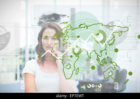 Blonde businesswoman using green map interface Stock Photo